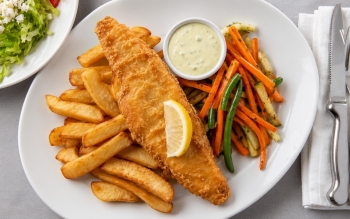 Fresh Cod prepared English style, served with tartar sauce