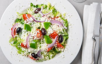 Romaine topped with Feta cheese, green pepper, red onion, cucumber, tomato, olive and dressing